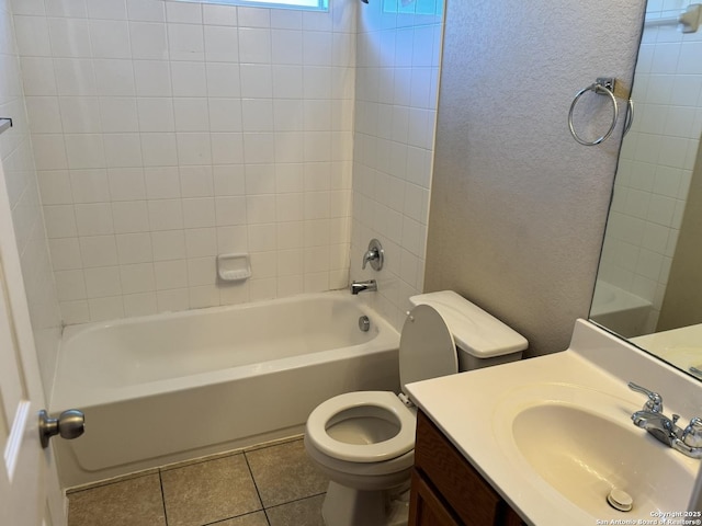 full bathroom with tile patterned floors, vanity, toilet, and shower / tub combination