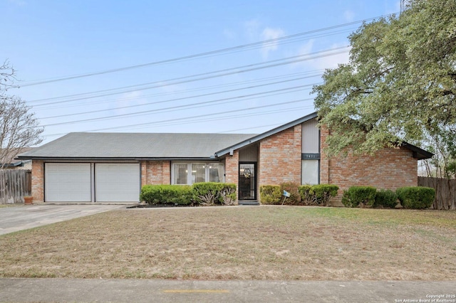 ranch-style house with a garage and a front lawn