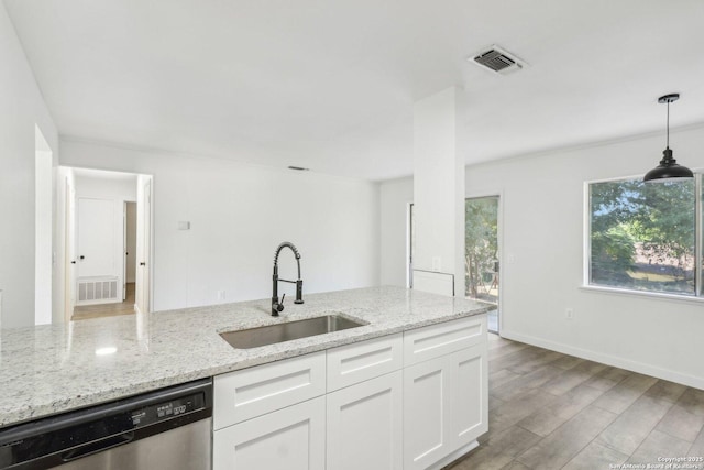 kitchen with white cabinetry, sink, dishwasher, light stone counters, and decorative light fixtures