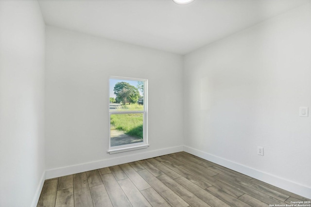 unfurnished room featuring light hardwood / wood-style flooring