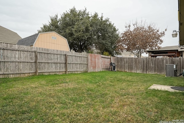 view of yard with central AC