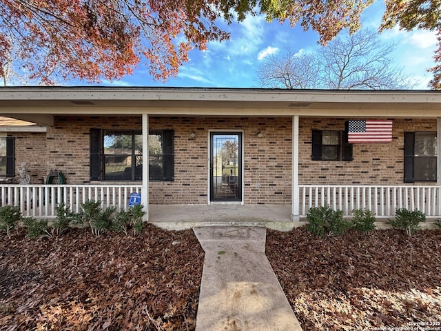 entrance to property with a porch