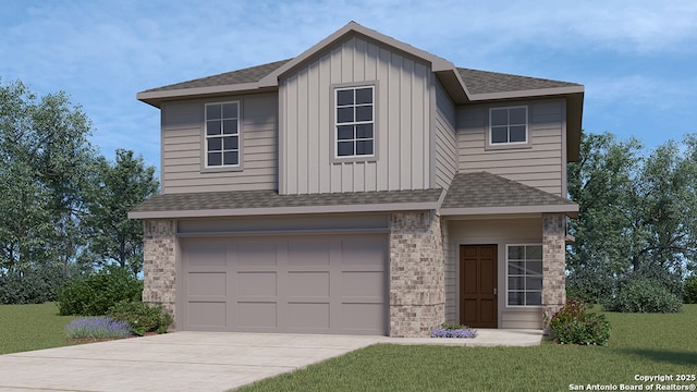 view of front of home with a front yard and a garage