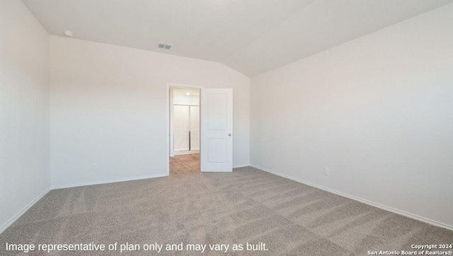 3216 Pemberton Rose, San Antonio, TX 78245 - unfurnished room with light colored carpet and vaulted ceiling