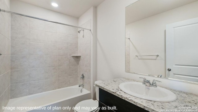 3216 Pemberton Rose, San Antonio, TX 78245 - full bathroom with tiled shower / bath, vanity, and toilet