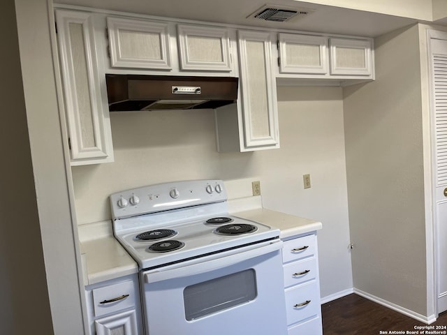 kitchen with white range with electric cooktop, dark hardwood / wood-style flooring, white cabinetry, and exhaust hood