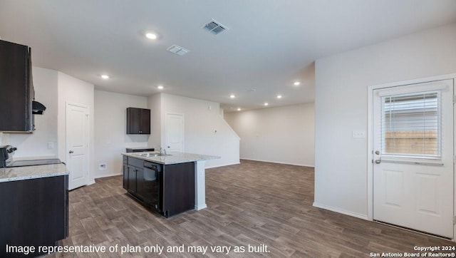 kitchen with sink, black dishwasher, dark hardwood / wood-style floors, an island with sink, and range