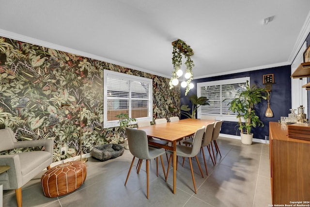 dining space featuring tile patterned flooring and crown molding