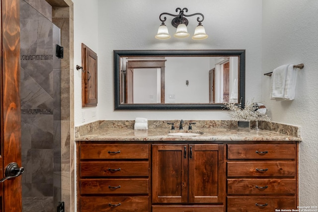 bathroom featuring vanity and walk in shower