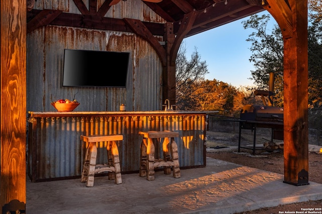 view of patio featuring an outdoor wet bar