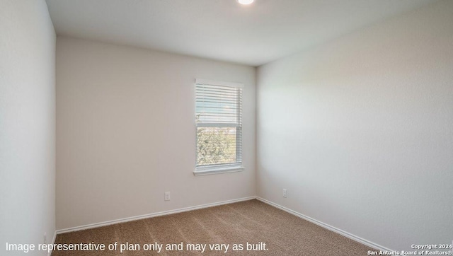 unfurnished room featuring carpet floors