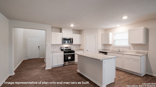 kitchen featuring white cabinetry and stainless steel appliances