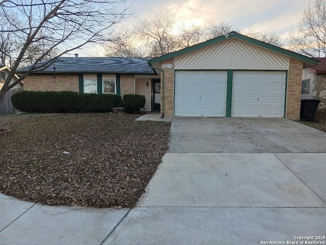 single story home featuring a garage