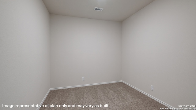 empty room featuring carpet floors