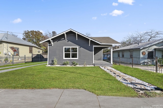 bungalow-style home featuring a front yard