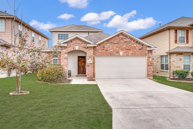 front of property featuring a garage and a front lawn