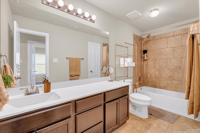 full bathroom featuring tile patterned flooring, vanity, toilet, and shower / bathtub combination with curtain