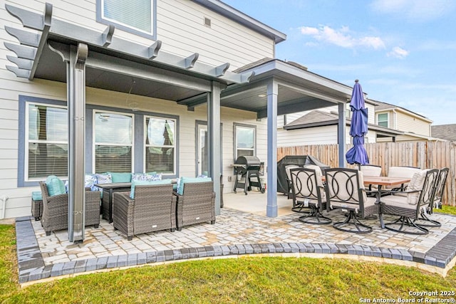 view of patio / terrace featuring an outdoor living space and a grill