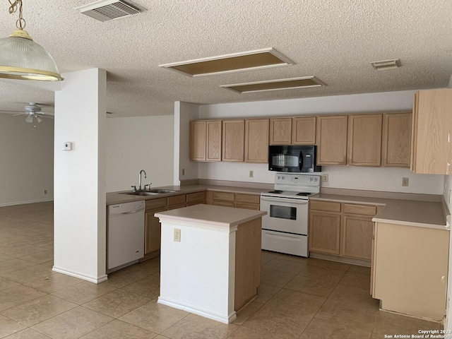 kitchen with white appliances, sink, hanging light fixtures, ceiling fan, and a kitchen island