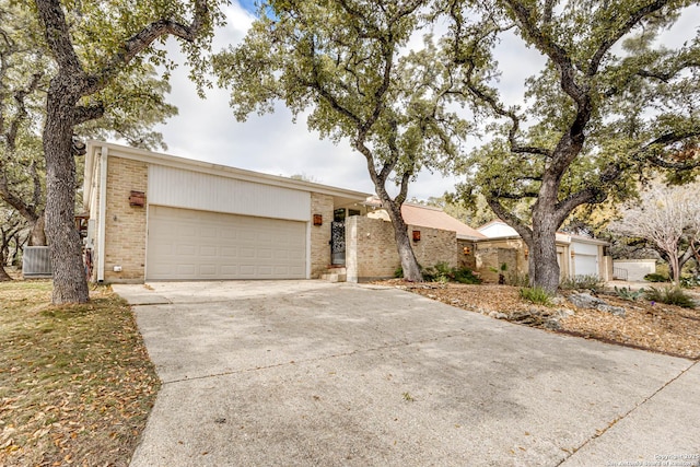 single story home featuring a garage