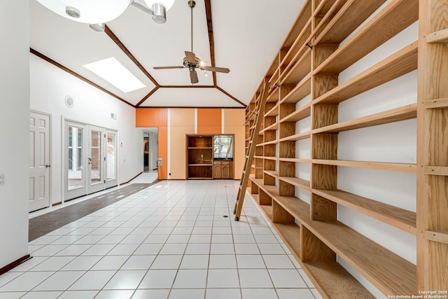 interior space with ceiling fan and french doors