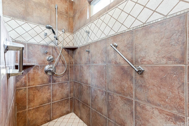 details featuring a tile shower