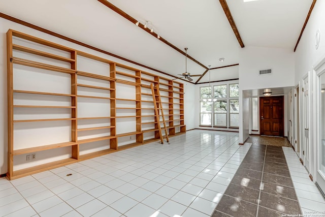 foyer with ceiling fan, beamed ceiling, and high vaulted ceiling