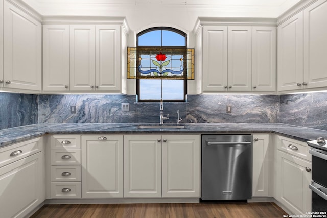 kitchen featuring white cabinetry, sink, tasteful backsplash, dark stone counters, and stainless steel electric range