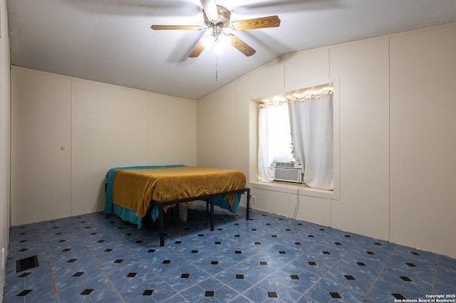 bedroom with ceiling fan, cooling unit, and lofted ceiling