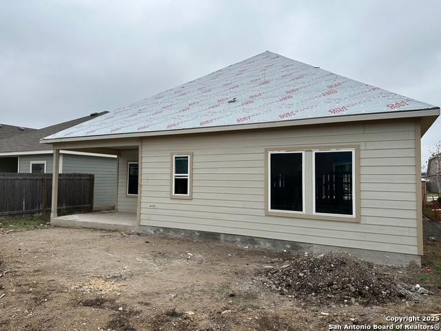 rear view of house featuring a patio