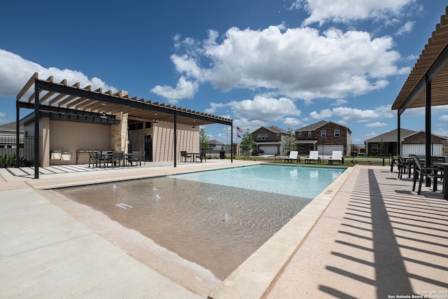 view of pool featuring a patio