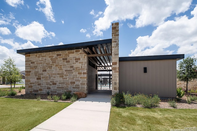 14502 Gunsight Pass, San Antonio, TX 78253 - doorway to property featuring stone siding and a chimney