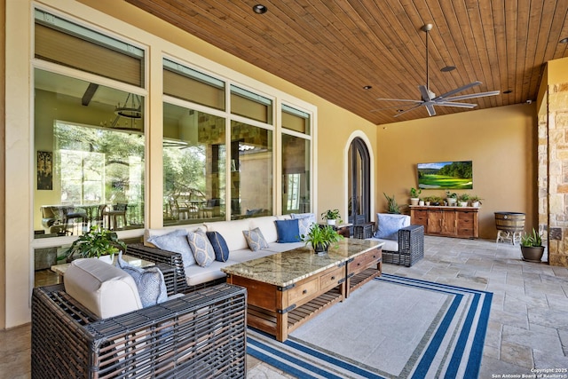 view of patio featuring ceiling fan and an outdoor hangout area