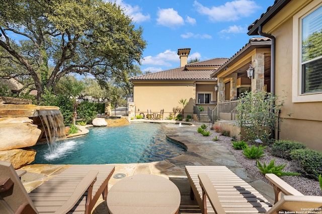 pool featuring a patio area