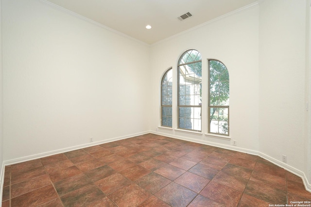 unfurnished room featuring ornamental molding