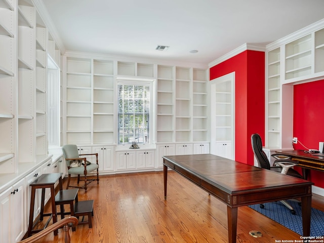 office area featuring crown molding, built in features, and light hardwood / wood-style flooring