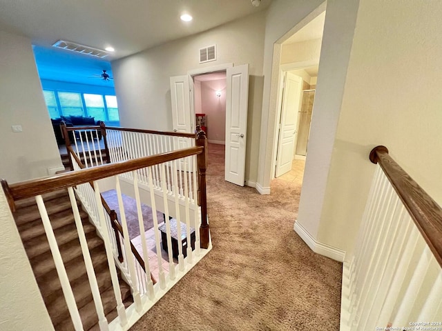 corridor featuring carpet flooring