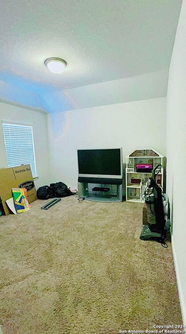 interior space with a textured ceiling