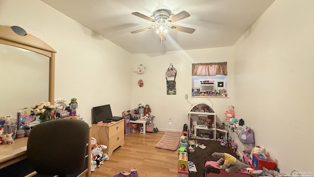 interior space featuring ceiling fan and light hardwood / wood-style floors