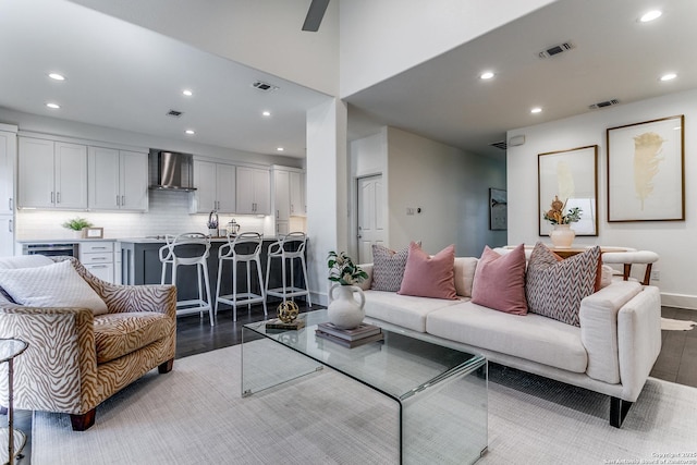 living room featuring dark wood-type flooring