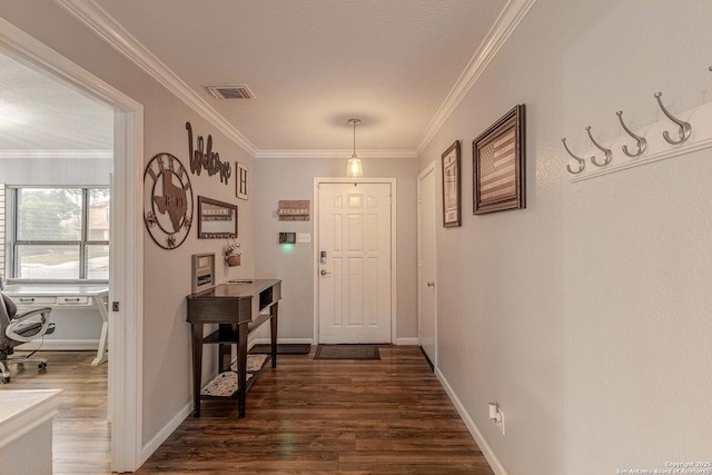 doorway featuring a textured ceiling, dark hardwood / wood-style floors, and crown molding