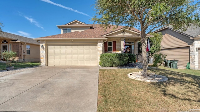 view of front of house featuring a front yard and a garage