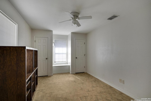 unfurnished bedroom with ceiling fan