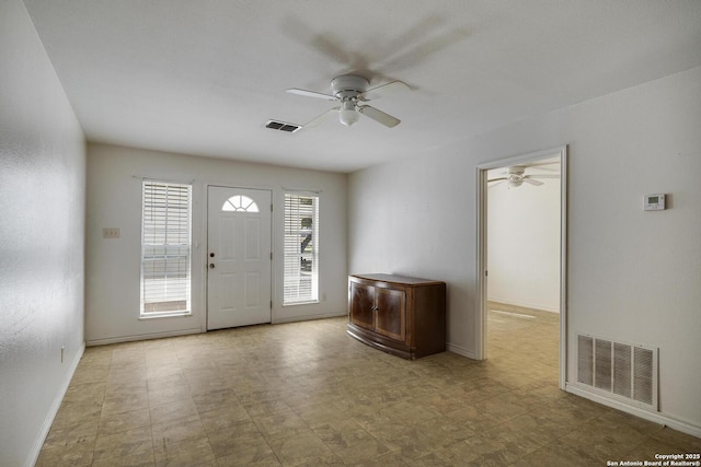 foyer featuring ceiling fan