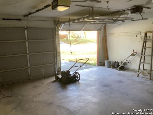 garage featuring a garage door opener