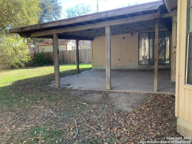 view of patio with a carport