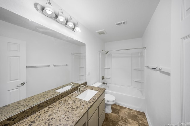 full bathroom featuring toilet, vanity, and bathing tub / shower combination