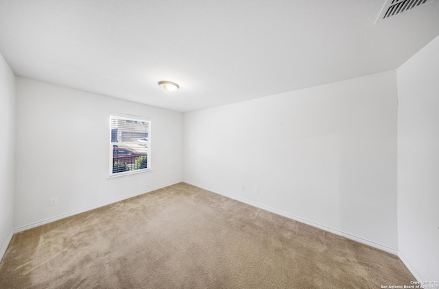 unfurnished room with carpet flooring