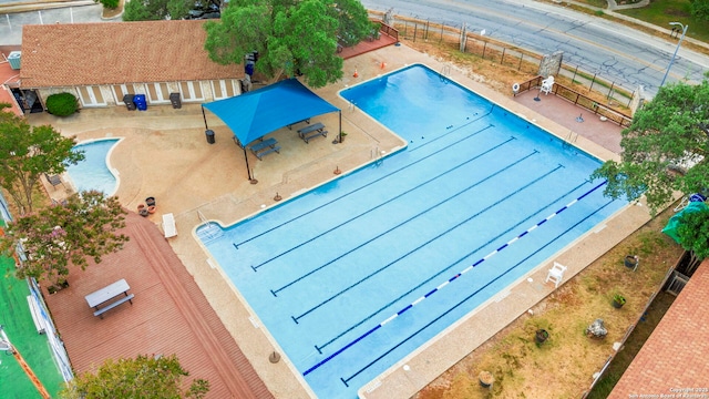 view of swimming pool with a patio