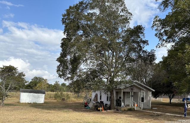 exterior space featuring a storage shed